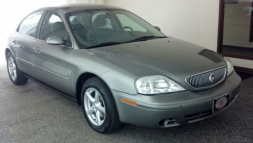 Green 4 door sedan gray interior very clean carfax guaranteed