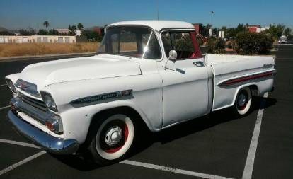1959 chevy apache big window short bed with side molding (chrome spires )
