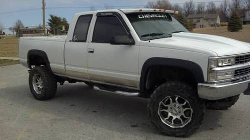 91 chevy 4x4 with lift, white exterior, ext cab, with edelbrock carb, fosgate