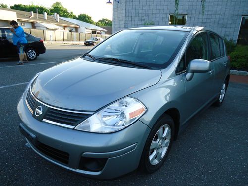 2009 nissan versa s hatchback 4-door 1.8l runs/drives great needs tlc no reserve