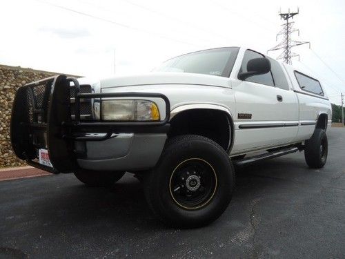 4x4-5 spd-5.9l cummins-4 door extcab-laramie/slt-centurycampr-1 txownr-nvr hitch