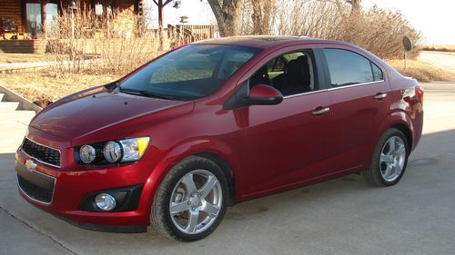 2012 chevy sonic ltz 4 door sedan~1.8l ~ only 3,000 miles!