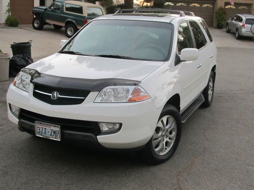 2003 acura mdx touring low mile 1 owner super clean perfect inside and out.