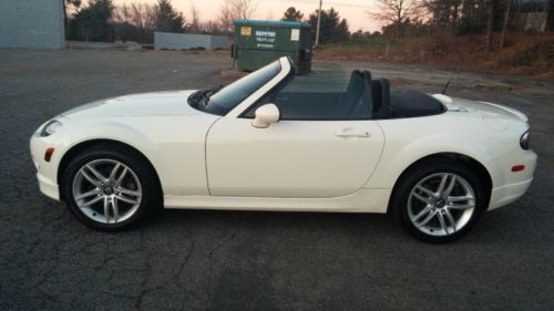 Low low miles only 31k original miles 5-speed  sport convertible