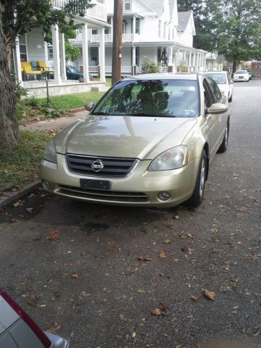 Gold/tan nissan altima 2002 sl 2.5 please read description first