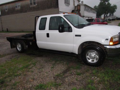 Ford f350  extended cab  2 wheel drive with custom steel flatbed