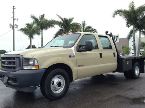 Only 105k miles! 2004 ford f-350 flatbed utility crew cab dually turbo diesel!