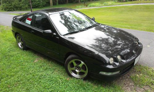 Black on black gs-r w/sunroof, two sets of wheels and tires.