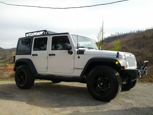 Custom wrangler unlimited under 2k miles