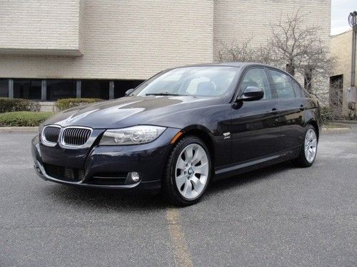 Beautiful 2009 bmw 335i x-drive, just serviced, rare 6-speed manual, loaded