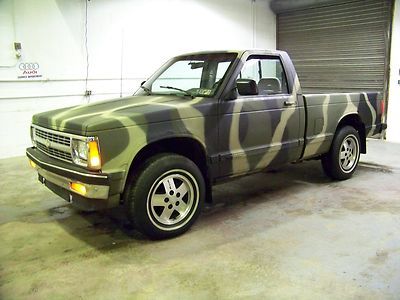 No reserve...low miles...stick shift...4x4...camo paint