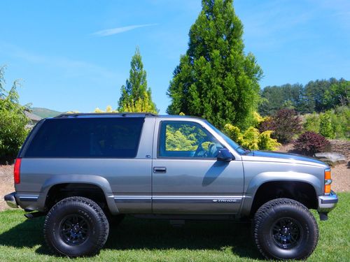 2 door tahoe,4x4,1 owner,low miles,super lift,bfg tires,mt wheels, x-clean!!!!!!