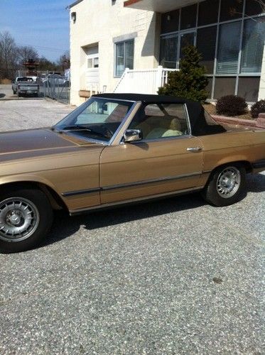 1985 380 sl/560 sl 2 door gold convertible-excellent condition