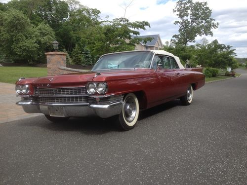 Two 1963 cadillacs convertible (one for its body and one for parts)