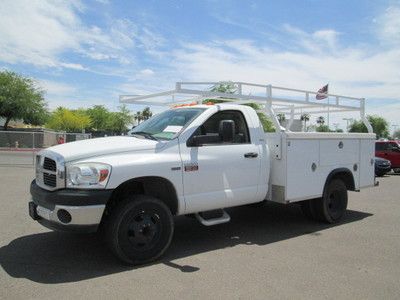 2007 white automatic miles:16k regular cab work truck with rack and bins