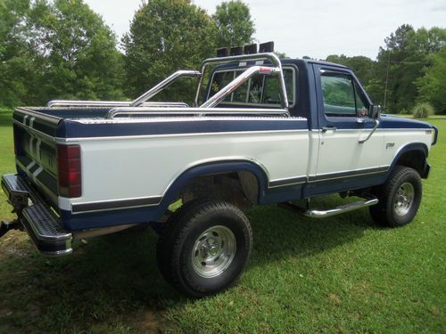 1984 ford f-150, auto, 302v8, swb, 4wd, lifted, a/c, 2nd owner,low miles