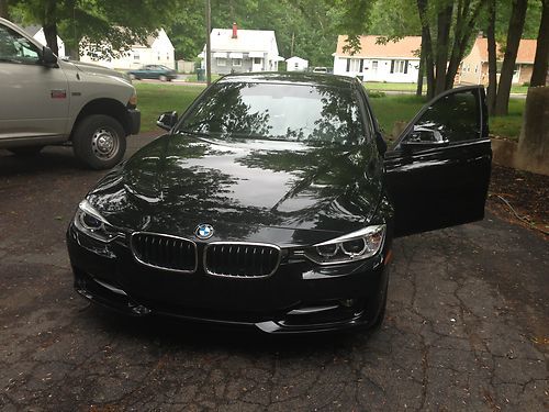 14k miles, black interior and exterior, sunroof, satellite radio