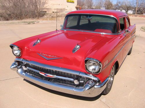 57 chevy,2 dr sedan, resto mod, body off, loaded, 5 speed, fresh