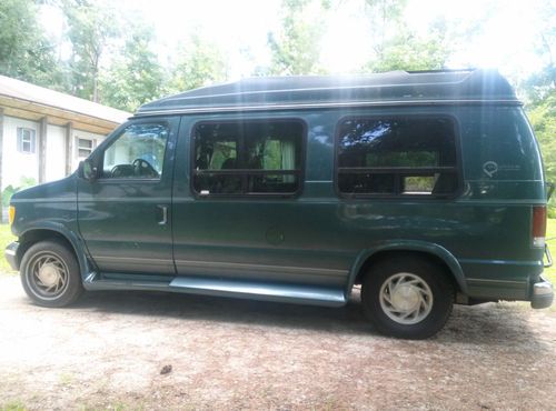 1995 green ford handicap van-w/ricon lift (low miles runs great)