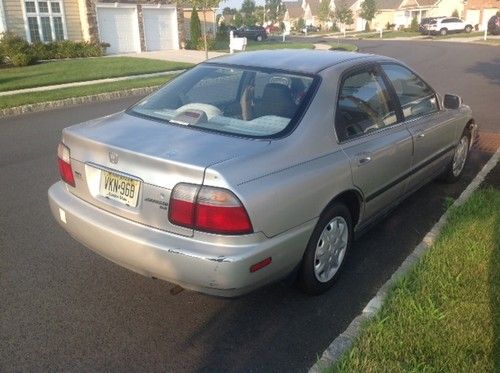 4 cyl, great on gas, cd player, no reserve