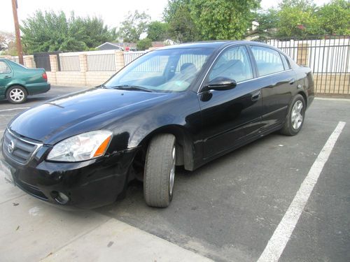 2002 nissan altima base sedan 4-door 2.5l