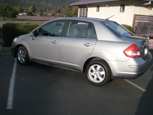 2007 nissan versa sl.  grey exterior and interior 62594 miles, $7900.00.