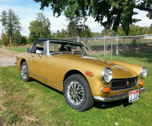 1974 mg midget 4 cyl. 1275cc new paint,new top,great tires,interior fair