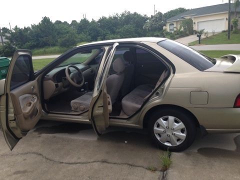 2001 nissan santra in good condition, new tires, new battery, cold ac.