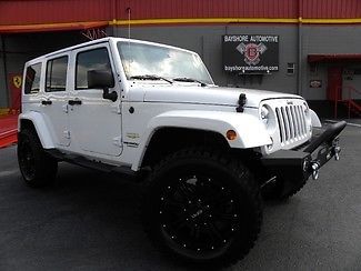 New pro-comp lift*35&#034; tires*20&#034; dpr wheels*white/white leather*we finance*fla