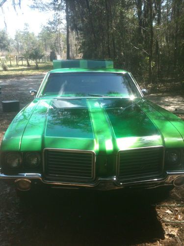 2 door green ,custom paint and wheels,