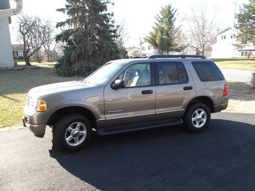 2005 ford explorer xlt. gray exterior with tan cloth interior. great winter suv.
