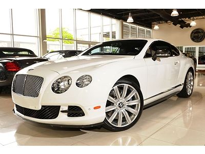 Orig msrp $213,845; +$19,000 carbon fibre mulliner pkg; glacier white/beluga
