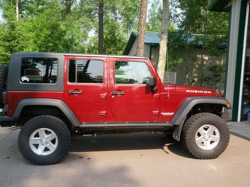 Jeep wrangler rubicon unlimited 2009 red rock red