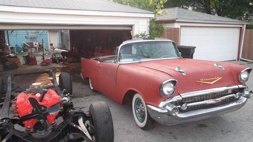 1957 chevy convertible and a extra restored frame compleate with original drive