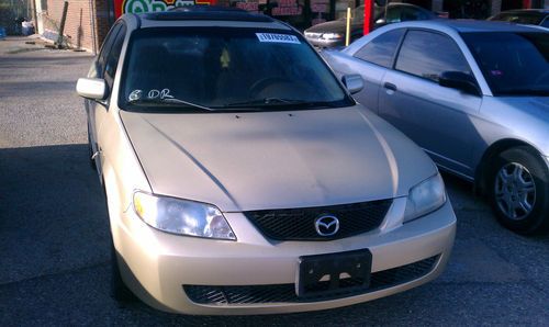 2002 mazda protege dx sedan 4-door 2.0l