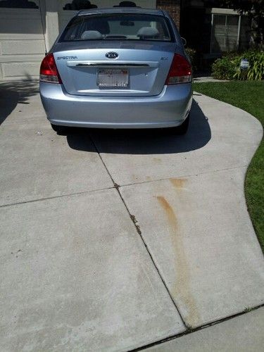 2007 kia spectra ex , 66,000 miles, salvage title like new, light blue sedan