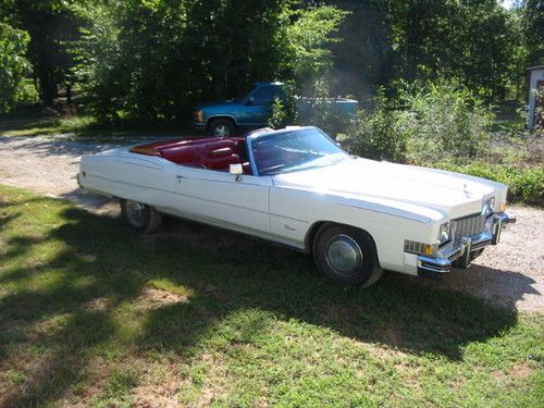 White 1973 eldorado cadillac convertible w/ red interior