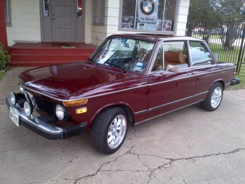 1976  bmw 2002 malaga red, new bucksin leather interior, all new