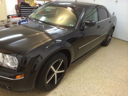 Loaded black 2007 chrysler 300 touring sedan 4-door 3.5l with custom wheels/nav!