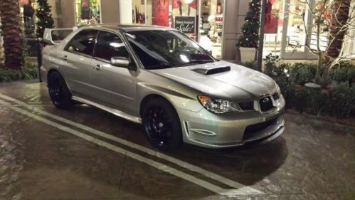 Subaru wrx sti 10/10 inside and out. 1 year warranty! tasteful lite mods. fast!