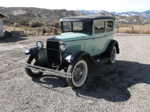 1930 model a ford two door. this is a good solid model a - all steel body