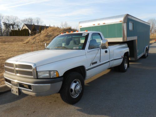 Dodge cummins dually pickup truck with 24-foot aluminum gooseneck vendor trailer