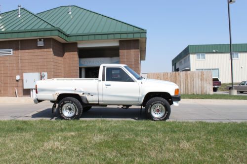 2nd owner truck. runs great. 2.4/ 4 cylinder 22re motor, 5 spd,working 4x4