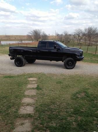 Blacked out lifted dodge dually