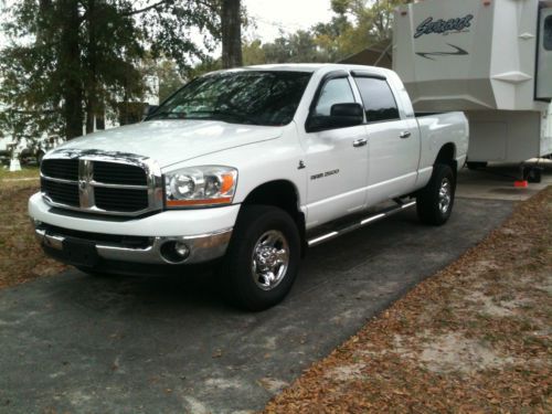 Ram 2500 mega cab, white with grey leather, very good condition