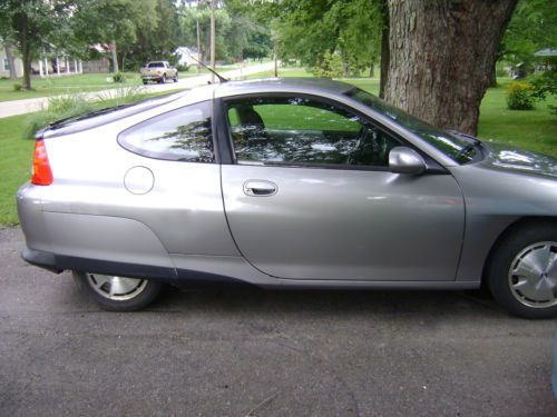 Go green with 2000 honda insight hybrid hatchback, gets 50-60 mpg  no reserve!