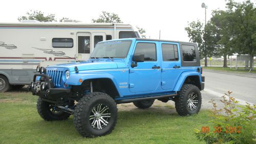 Custom 2010 jeep wrangler sport unlimited with moab conversion