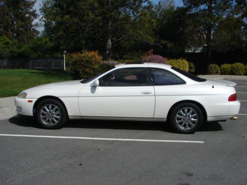 Super white, automatic agile coupe