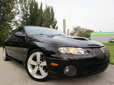 6.0 gto 2dr coupe black on black 400hp auto leather low miles carfax guarantee