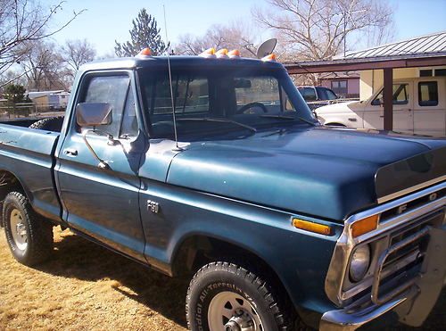 Metallic blue ford f-100 4x4